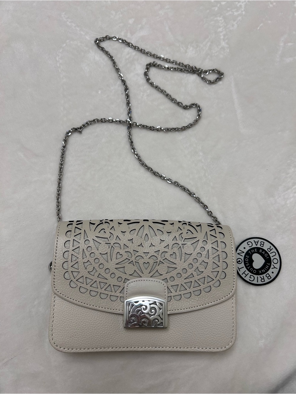 Brighton Cream Laser-Cut Crossbody with Silver Chain